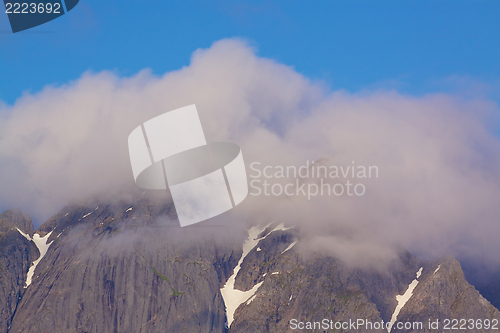 Image of Peaks in clouds