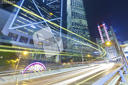 Image of Busy traffic at night in city