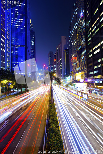 Image of Busy traffic at downtown city at night