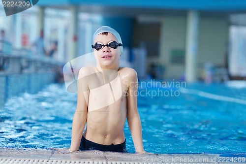 Image of happy child on swimming pool