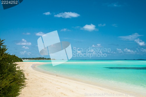 Image of beautiful tropical landscape, blue water and white sand