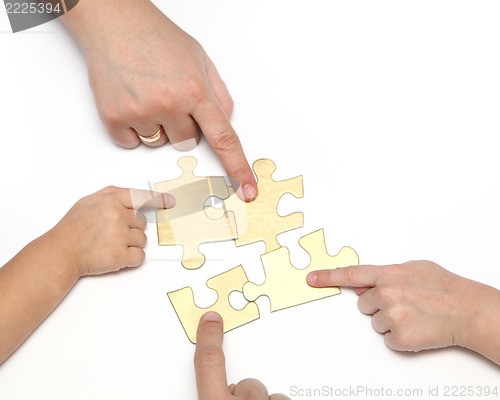 Image of hand with puzzle