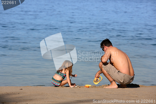 Image of Father and daughter on the beach