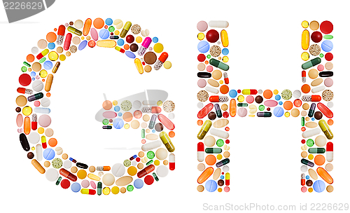 Image of Characters G and H made of colorful pills
