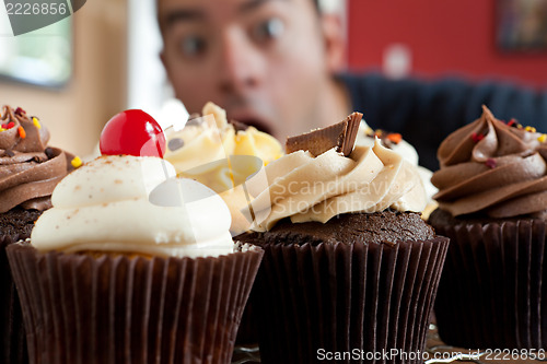 Image of Man Wants to Eat Cupcakes