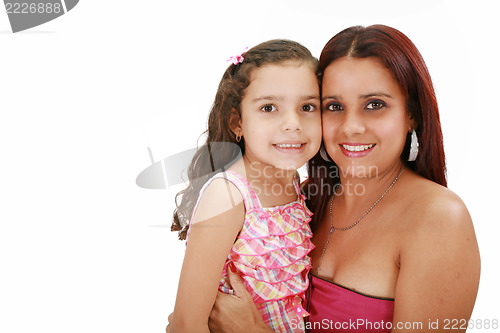 Image of Young latin mother hugging her daughter isolated on a white back