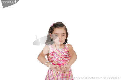 Image of portrait of a beautiful little girl with thumb down isolated on 