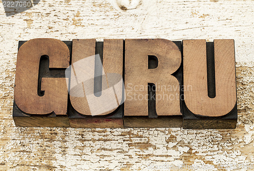 Image of guru word in wood type