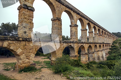 Image of Roman Aqueduct Pont del Diable in Tarragona, Spain 