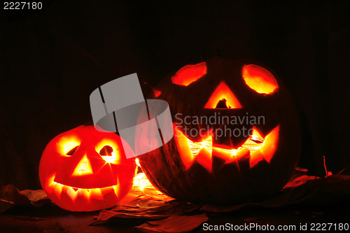 Image of Halloween pumkins on the black background 