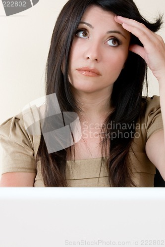 Image of Stressed working woman