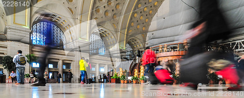 Image of human traffic at train station