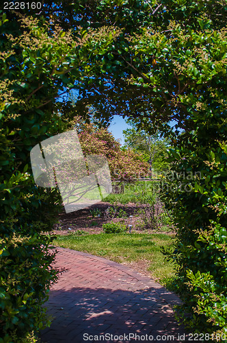 Image of arched entrance into garden