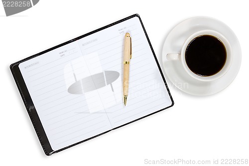 Image of Notebook and coffee cup