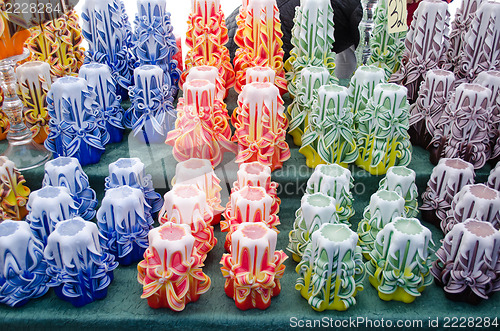 Image of colorful decor wax candle sell outdoor market fair 