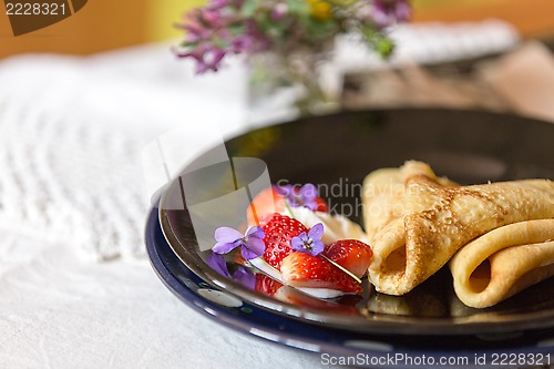 Image of Pancakes, strawberries and cream