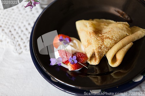 Image of Pancakes, strawberries and cream