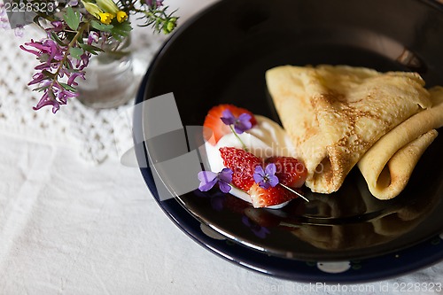 Image of Pancakes, strawberries and cream