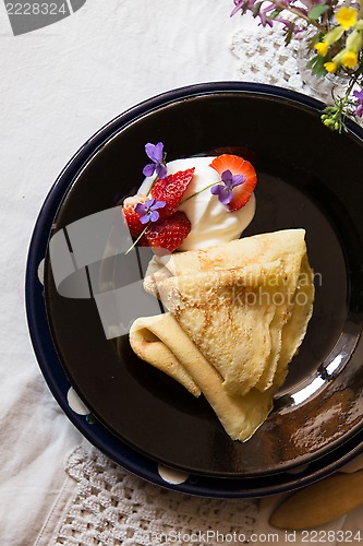 Image of Pancakes, strawberries and cream
