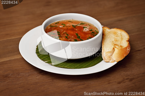 Image of Seafood soup with toasted bread