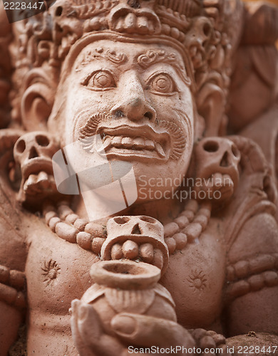 Image of Stone statue of an ancient deity. Indonesia, Bali
