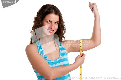Image of Sporty Woman Measuring Her Biceps