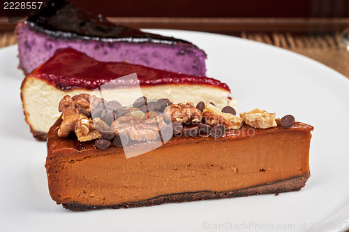 Image of cheesecake with chocolate and nuts