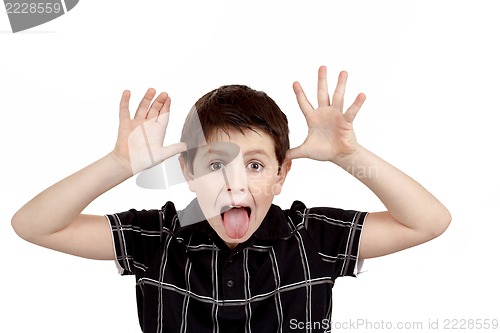 Image of Young boy grimacing