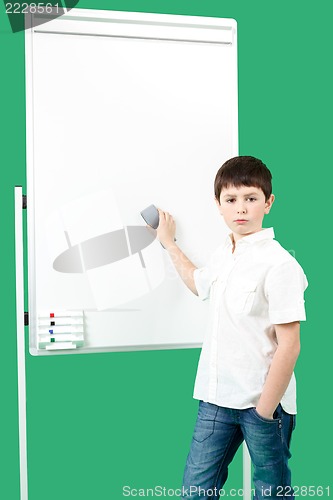 Image of Portrait of happy little boy with white blank board