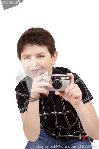 Image of small boy photographing horizontal with digital camera