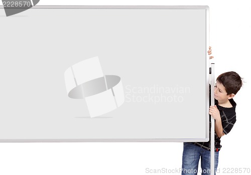 Image of Portrait of happy little boy with white blank board