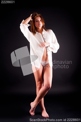 Image of young sexy woman in white shirt