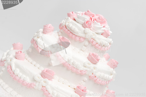 Image of Pink and white delicious luxurious wedding cake