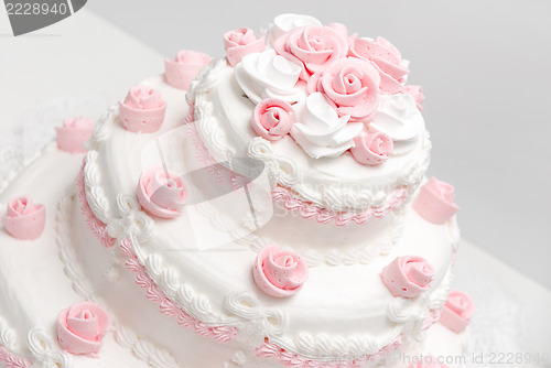 Image of Pink and white delicious luxurious wedding cake