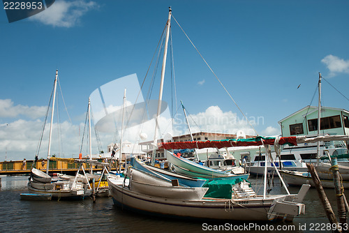 Image of Row of white yachts in the port, Belize City