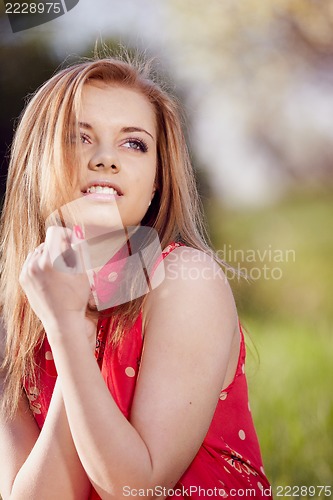 Image of Girl on the background of spring green