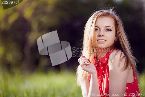 Image of Girl on the background of spring green