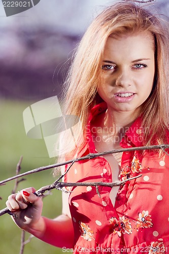 Image of Sexy girl in red blouse