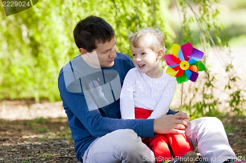 Image of happy family at the park