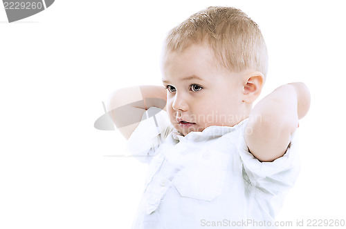 Image of Handsome small boy with raised arms