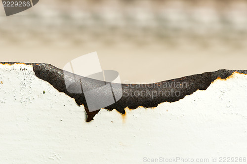 Image of Rust and cracked paint.