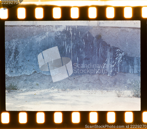 Image of Aged street wall background. Film strip