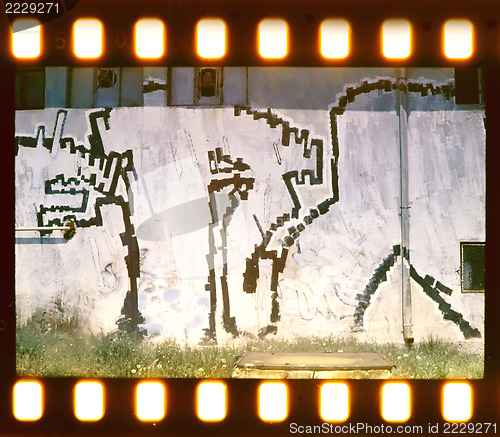 Image of Aged street wall background. Film strip