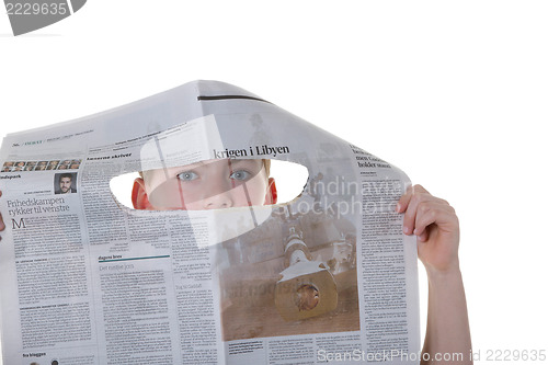 Image of Reading newspaper