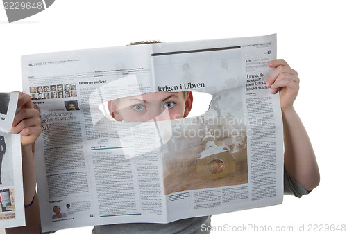 Image of Reading newspaper