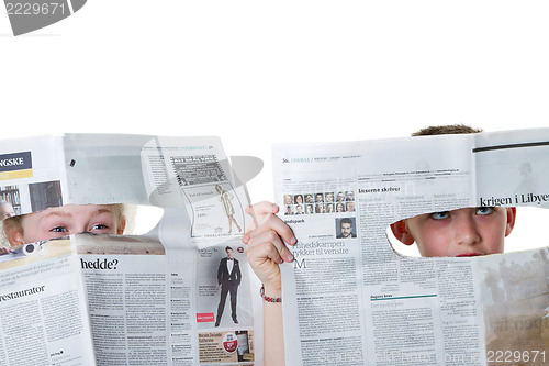 Image of Reading newspaper