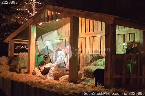 Image of Live Christmas nativity scene reenacted in a medieval barn