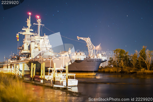 Image of Battleship North Carolina at it's home in Wilmington at night