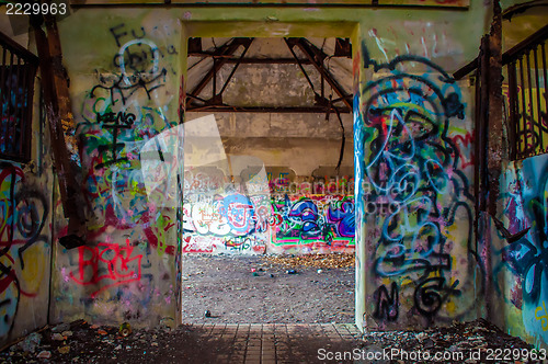 Image of abandoned building walls full of graffiti