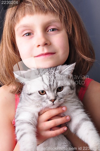 Image of child and cat